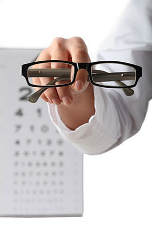 Eyeglasses In Front Of Eye Chart