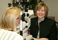 Optometrist With Slit Lamp