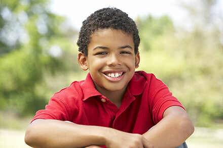 Boy in red shirt