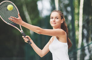 Young Woman playing tennis